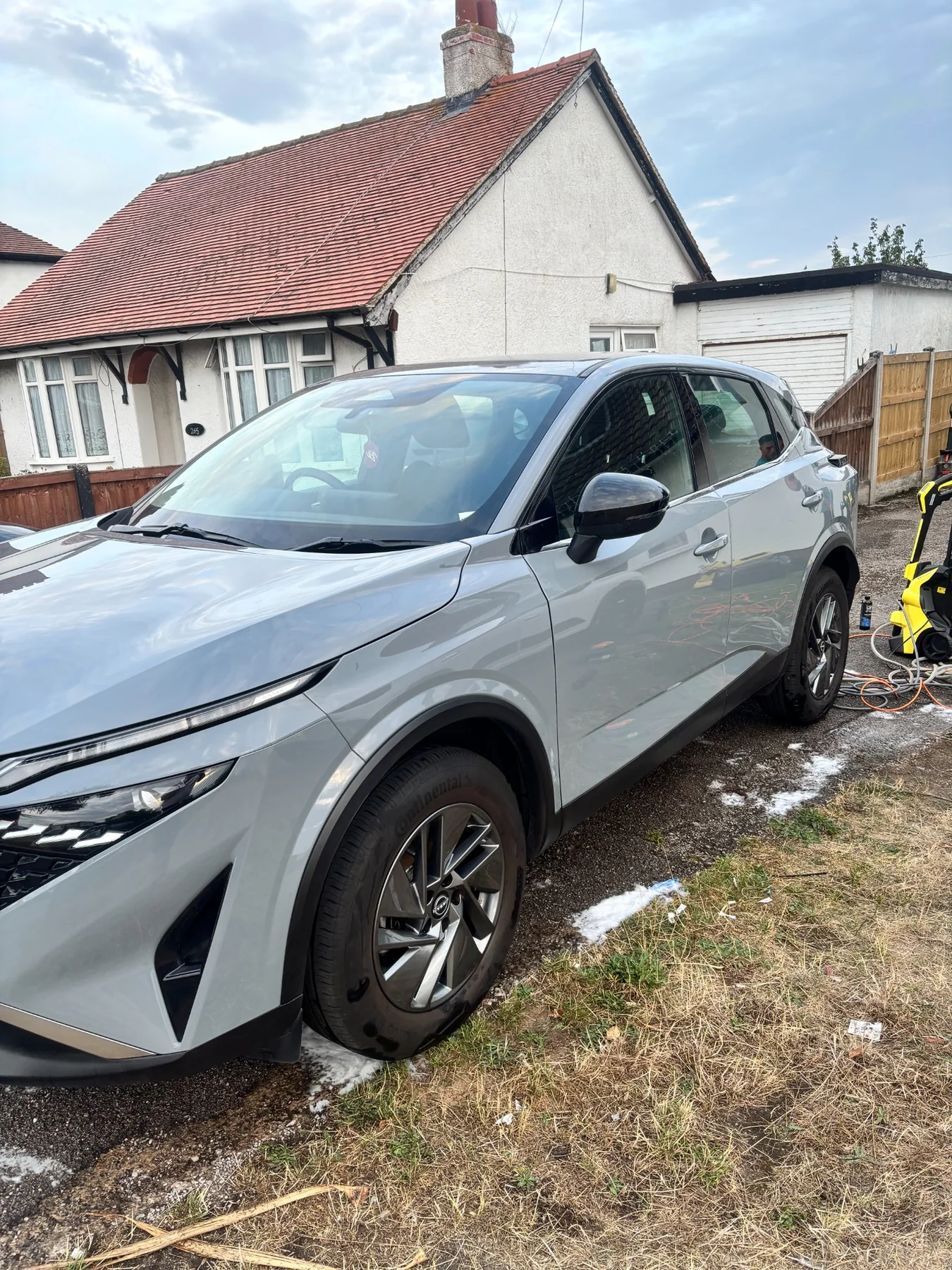 Freshly valeted grey Nissan front exterior